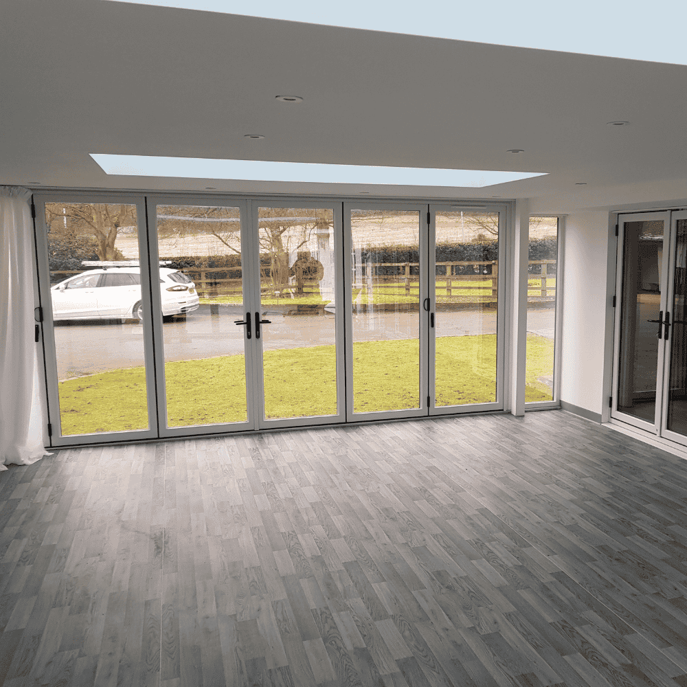 Bright interior with bifold doors and rooflight